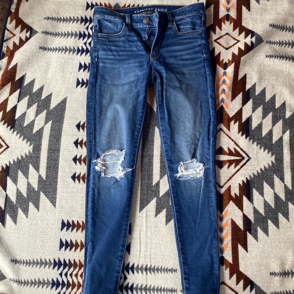 AE Distressed low rise skinny jeans